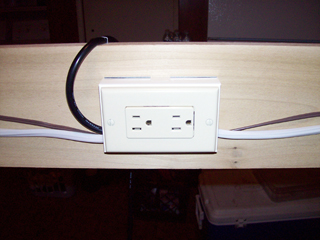 Finished dual-bay outlet